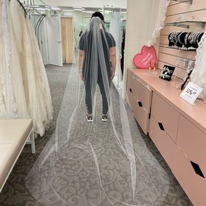 Raw edge tulle cathedral veil in ivory